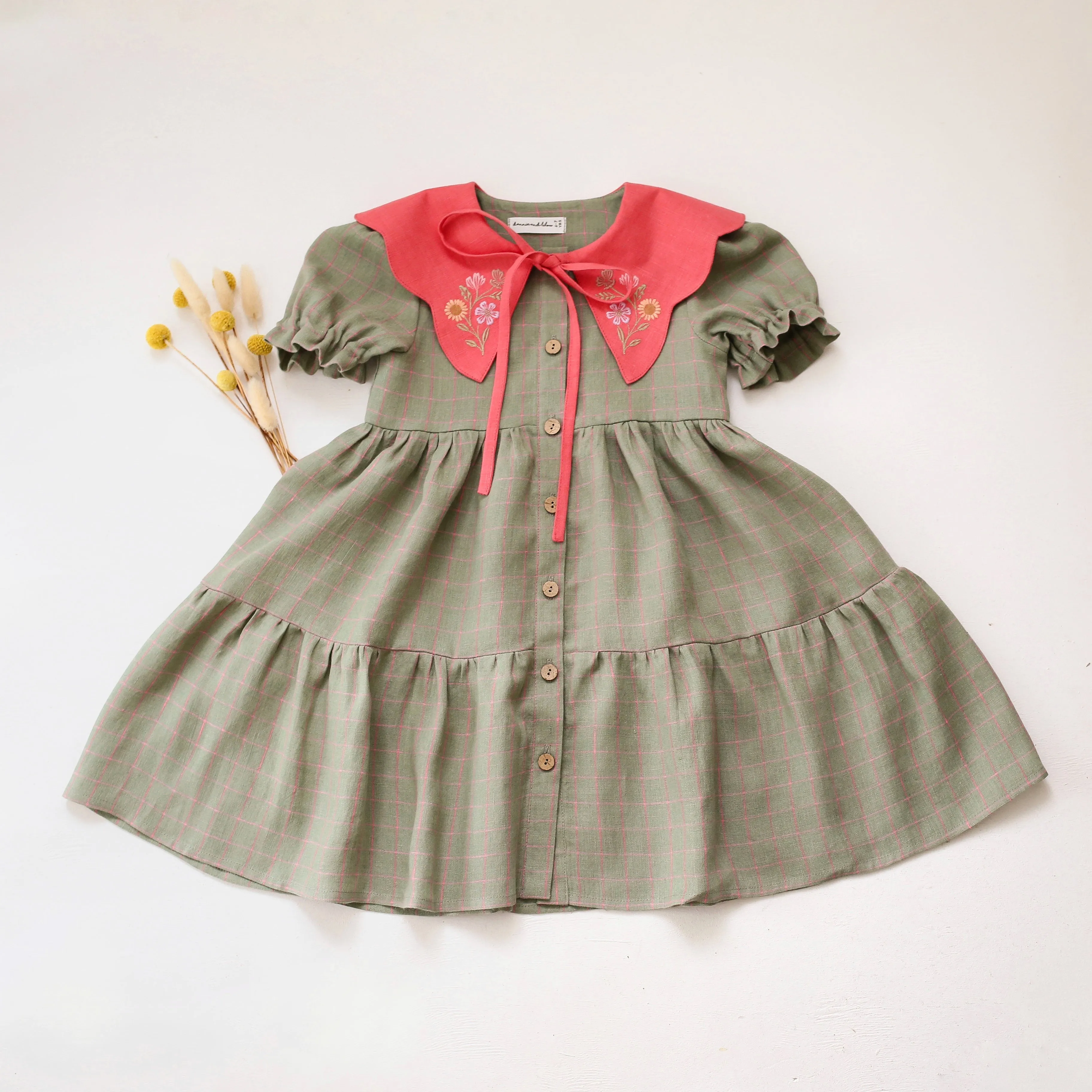 Mint & Pink Check Linen Short Sleeve Tiered Dress with Scalloped Collar in Coral Linen with "Petals Harmony" Embroidery